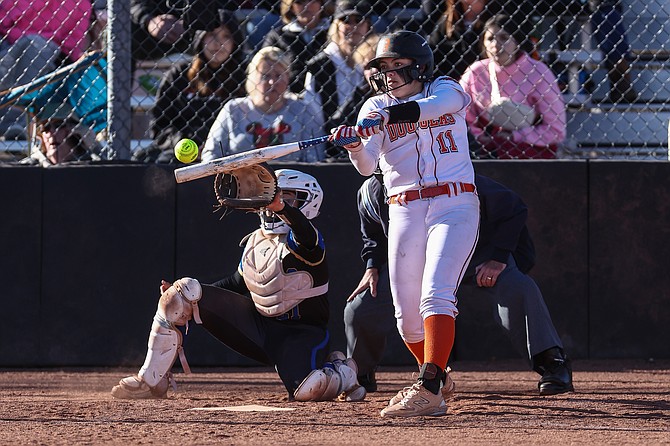 Douglas senior Zora Simpson connects Wednesday, knocking in one of her two RBIs in an 11-1 win against Reed. Simpson was 2-for-3 with a walk.