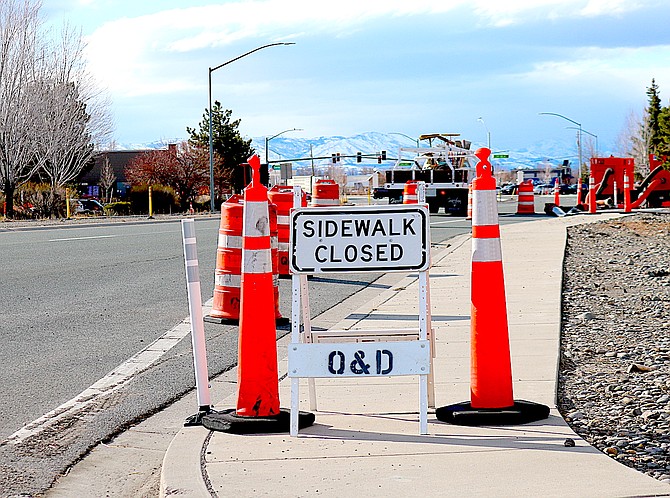 The sidewalk is closed in front of the Ironwood Center. Ironwood will be closed next week for utility work ahead of an overlay on Highway 395.