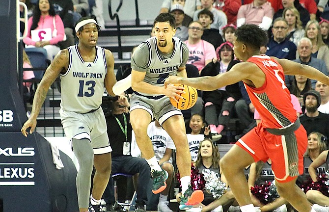 Nevada seniors Jerod Lucas, with ball, and Kenan Blackshear have been two of the Wolf Pack’s leaders all season. They will get one more shot at the NCAA Tournament, beginning Thursday with a first-round game against Dayton.