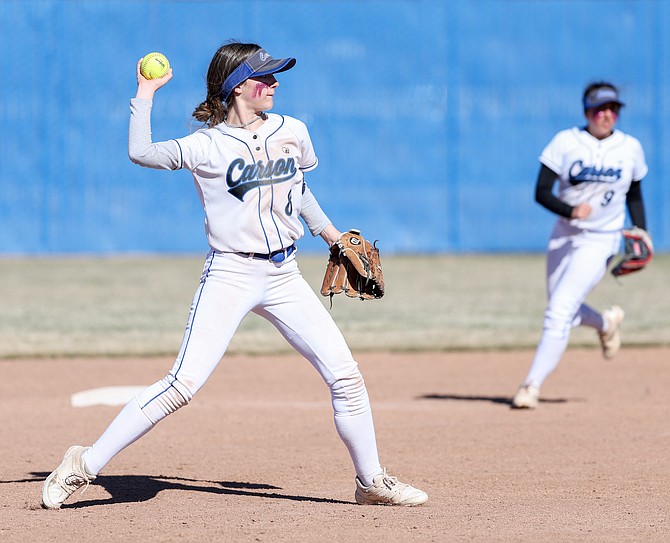 Carson High freshman Jordan Brubaker readies a throw to first base Friday in a win against Franklin (California) High. Brubaker went 2-for-3 with two RBIs.