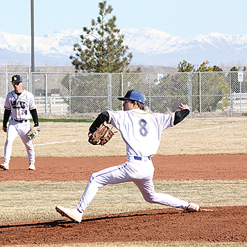 Lowry’s Matthew Casalez throws a pitch during Saturday’s opening game against Hug in Winnemucca.