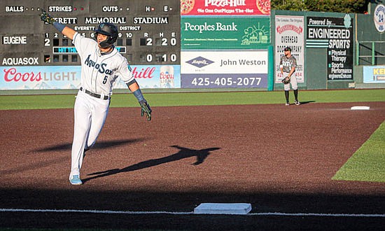 Outfielder Axel Sanchez salutes the fans after crushing a three-run home run in early innings during the June 28, 2023 game at Funko Field in Everett Memorial Stadium.