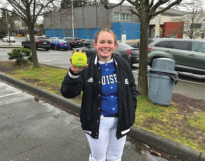Eatonville’s Grace Field poses with her home run ball after crushing a grand slam against Foster.