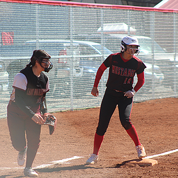 Yasmine McKinney gets ready to cross the home plate for the Mustangs on Saturday in Lovelock.