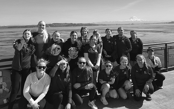 The Cruiser tennis team poses while traveling via ferry to Vashon Island.