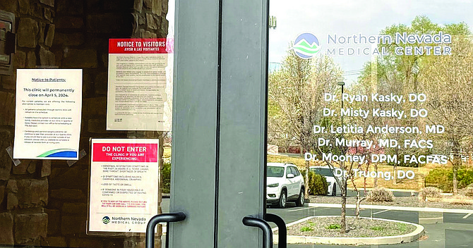 A “Notice to Patients” is shown posted on the door of Northern Nevada Medical Center about the permanent closing of the clinic.