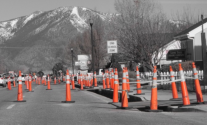 Topaz Ranch Estates photographer John Flaherty used a little digital magic to make the traffic cones pop in this photo of Main Street in Gardnerville. Once the trenching is done, I expect work will finally begin on repaving.