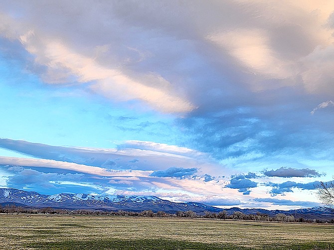 Lenticular clouds pass over Carson Valley on Tuesday in this photo by Pam Brekas.
