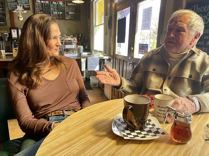 Lisa Pohll and Don Kuhl of Connections Central at Comma Coffee in Carson City on March 26.