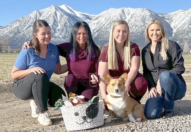 Poppy is center stage with Bailey Unruh of Carson Valley Health, Sequoia Wealth Advisors owner Kristina Kuprina, Poppy’s owner Sierra McMaster and Carson Valley Veterinarian Hospital Operations Manager Rebecca Civelli.
