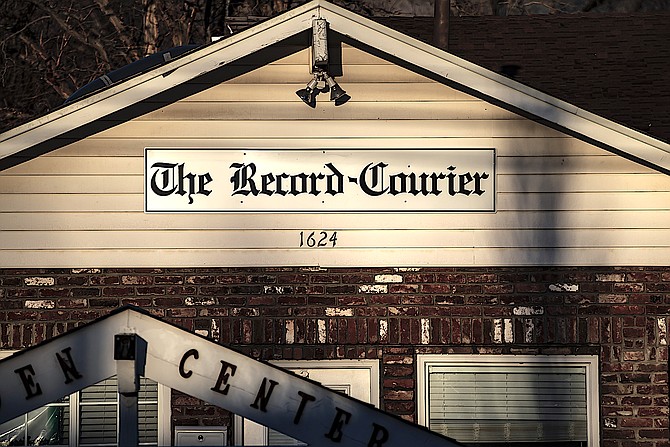 The early morning light catches the new Record-Courier sign at the newspaper's Minden office. Photo special to The R-C by Jay Aldrich