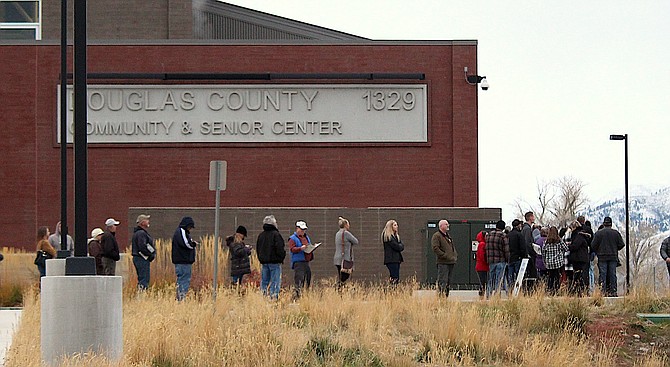 Voters line up on Election Day 2022 at the Douglas County Community & Senior Center in Gardnerville.