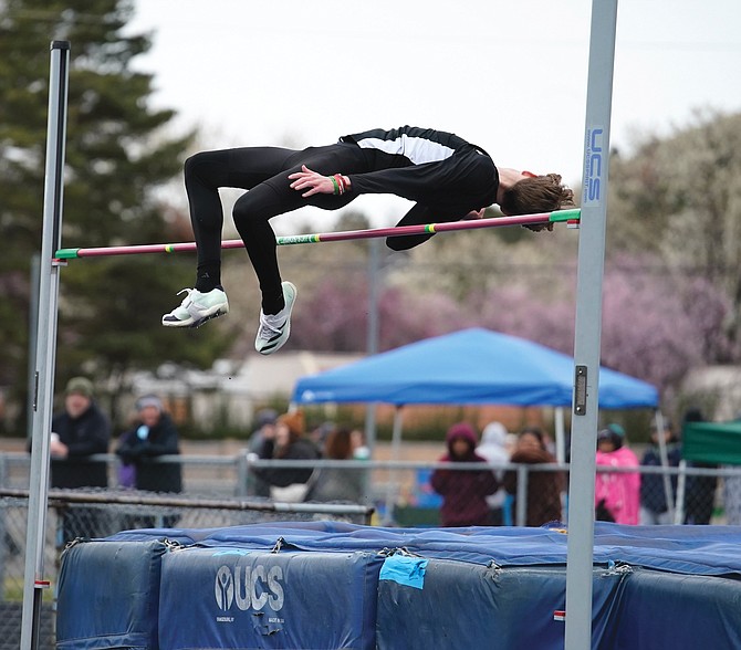 Fallon sophomore Bransyn Wright clears the bar at 6 feet, 2 inches, a personal best, to win the frosh/soph high jump at Friday’s Reed Sparks Rotary Invitational. His mark also would have won the varsity boys division.