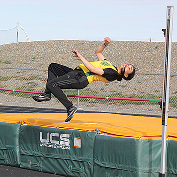 Battle Mountain's Andrea Alcaraz-Lopez makes it over the bar in the high jump.