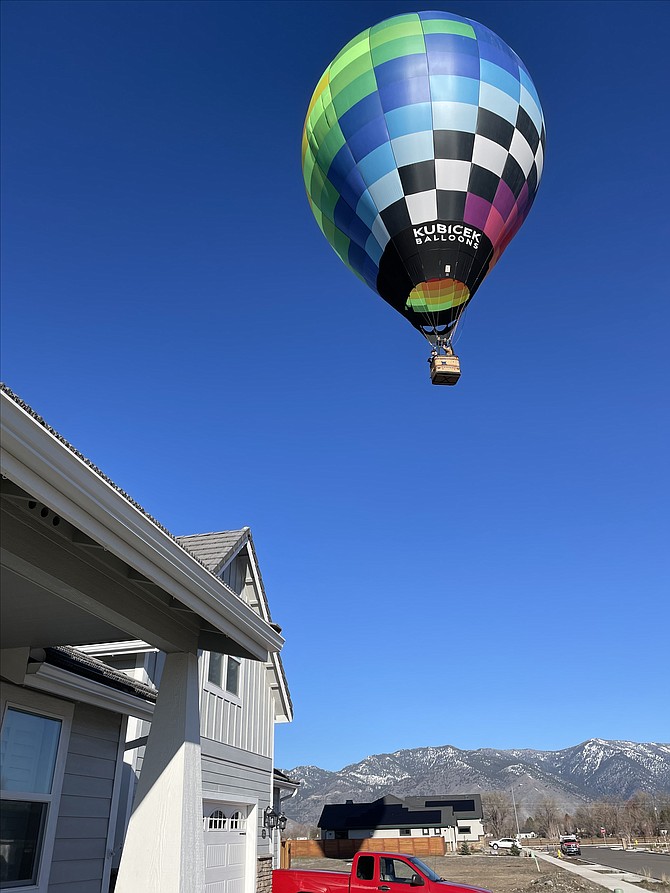 Marilyn Smith captured this photo of a balloon drifting over her place in Minden on Tuesday morning. She and husband Jim both sent in pictures. I plan on using his in Valley Views next week.