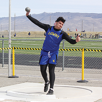 Lowry’s Nomar Aguirre throws the shot put at the Battle Mountain Invitational.