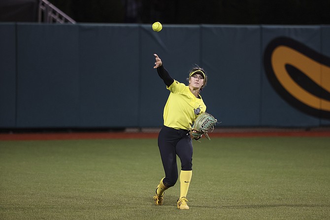 Carson High alumna and Oregon redshirt junior Kailee Luschar fires in a throw from the outfield during a game this spring. Luschar leads the Ducks’ softball team in batting average (.435) and stolen bases (21) this spring.