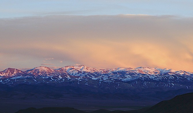 The setting sun illuminates the Sweetwater Range on Thursday evening. Photo special to The R-C by John Flaherty