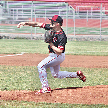 Pershing County’s Aaron Kienbaum pitches against the Oasis Academy Bighorns.