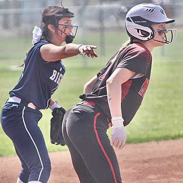 Taylor Garland takes off from second base in a home game with Oasis Academy on Saturday.