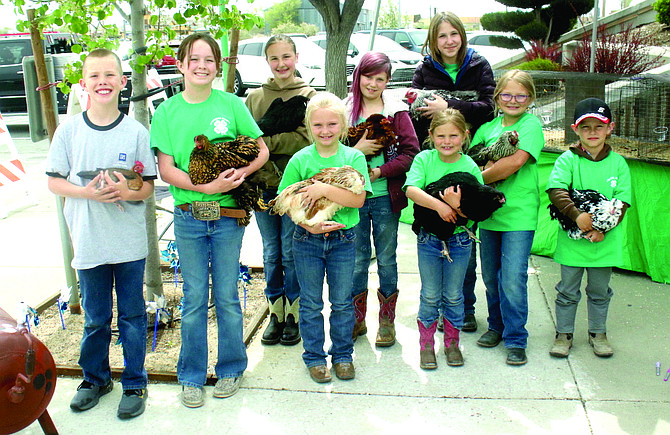The 4-H Hot Wings Poultry Club will be showing poultry at the 85th annual Churchill County Junior Livestock Show and Sale. Front row, from left: Ranger Farley, Reagan Farley, Alexandria Drake, Olivia Keyes, Hannah Keyes and Thurman Hiskett. Back row, from left: Angela Pratt, Adelyn Leitzke and Nicole Pratt.