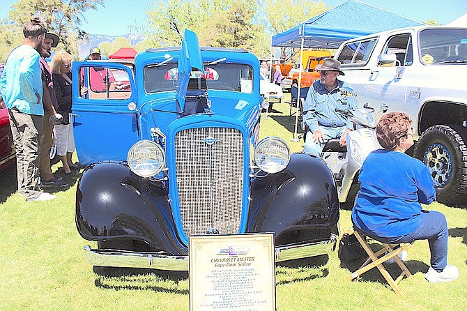 A blue Chevrolet sedan at the 2023 Big Mama's Show & Shine in Lampe Park. May will open with the Holy Smoker's car show across from Trinity Lutheran Church.