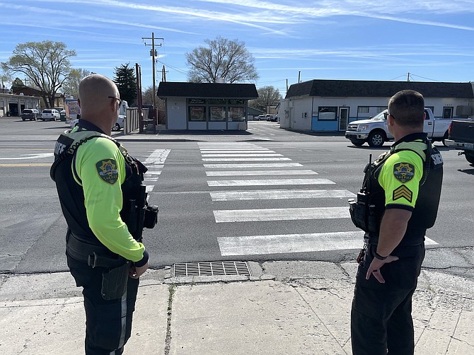 CCSO Deputy Michael Jerauld and Sgt. Matt Smith at the intersection of North Carson Street and Adaline Street conducting a crosswalk sting with the Appeal on April 16.