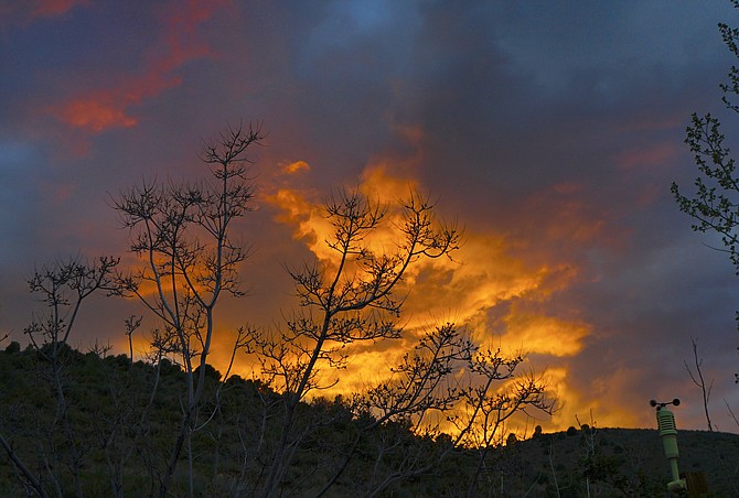 Sunset combined with storm clouds in Topaz Ranch Estates on Tuesday evening. Photo special to The R-C by John Flaherty