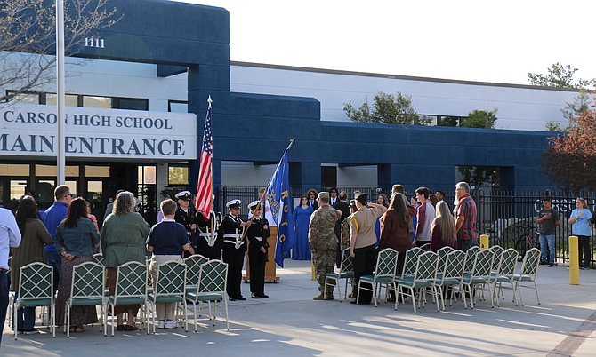 Members of Carson High School’s Naval Junior Reserve Officer Training Corps Color Guard unit present the colors during Wednesday’s Purple Star ceremony.