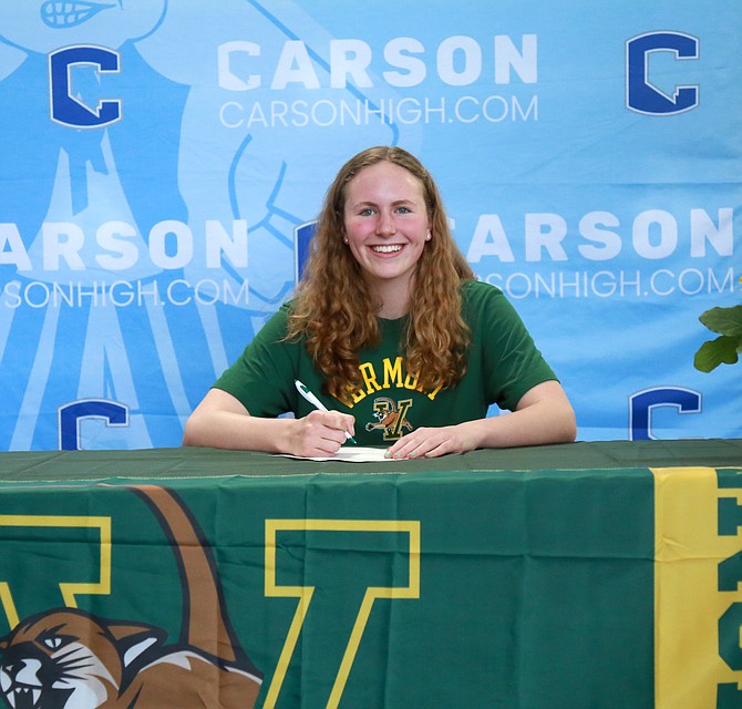 Carson High senior Brynn Russell smiles after signing her National Letter of Intent to swim at the University of Vermont. Russell helped set the school record in the 200-yard freestyle relay and is a part of the quickest 400-yard freestyle relay in the Class 5A North this season.