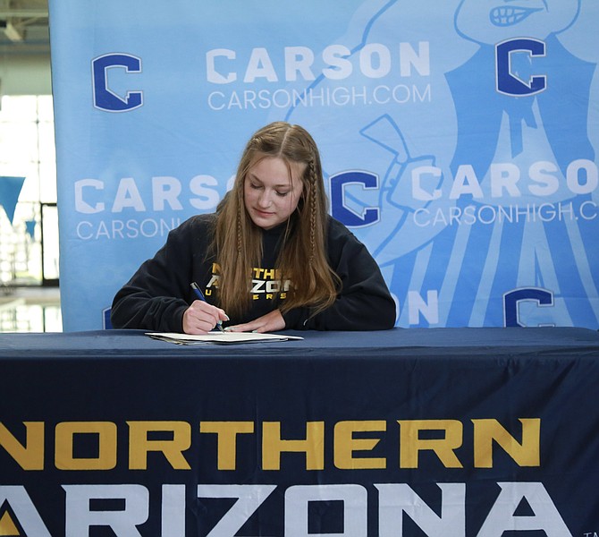 Carson High senior Katarina Klatt signs her National Letter of Intent to swim at Northern Arizona University. Klatt has set three Carson High swim records.