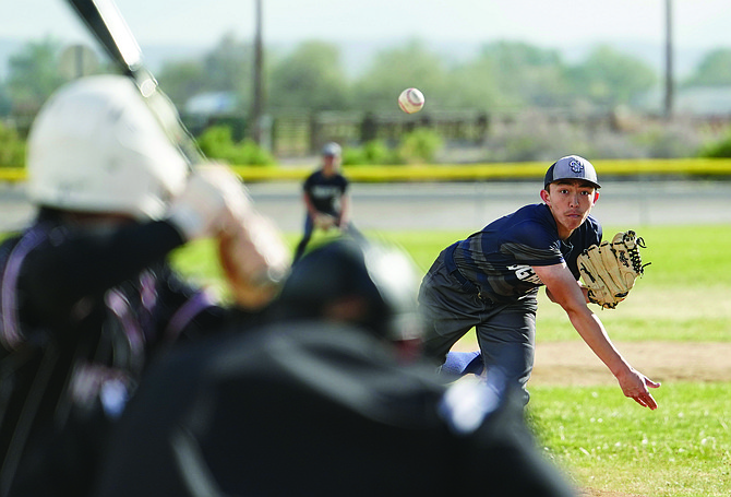 Oasis Academy’s Zachary Budner pitches against West Wendover on Friday.