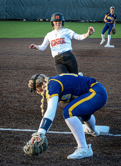 Everett Seagull third base freshman Hallie Oyler just misses the opportunity to tag at third as a Monroe player approaches. The Monroe Bearcats shut the door on powerhouse Everett, 7 - 6, on a sunny evening at Monroe High on Monday, April 24. Bearcat Junior Hadley Oylear led Monroe with a triple and two RBIs.  Everett’s pitcher, freshman Anna Luscher, pitched a partial game and went for 4-for-4 at the plate. 

Everett’s season has been 8-2 league, 11-4 overall) so far as of April 29. Monroe is nearly the same with 9-3 league, 11-6 overall.