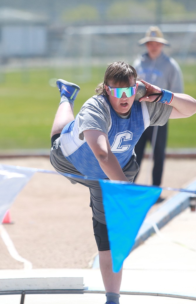 Carson High’s Ryan Barbarigos winds into his throw during the shot put at Carson High on Saturday. Barbarigos finished with a throw of just over 40 feet, taking 14th.