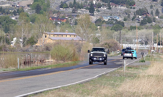 Motorists were able to avoid the water encroaching onto Mottsville Lane for the most part on Thursday morning.