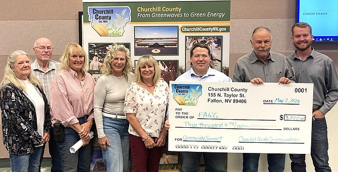 Commissioners approved $3,000 in funding for the local nonprofit Fallon Animal Welfare Group. From left: Linda Martinez, Commissioner Bus Scharmann, Debbie Hunter, Dianne Card-Latta, Carol Arciniega, Commissioner Justin Heath, Charlie Arciniega and Commissioner Myles Getto.