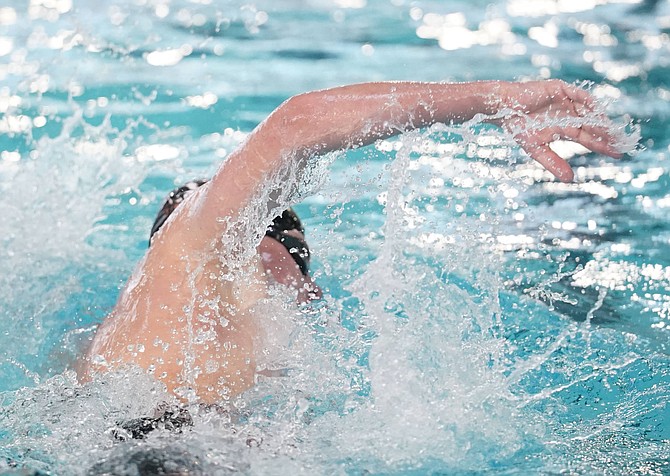 Douglas High sophomore Baylen Rowlett swims in the 500-yard freestyle at the Class 5A North regional swimming meet this past weekend. Rowlett took third place in the event and earned a trip to next week’s state meet in Las Vegas.