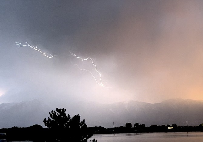 Carson Valley resident Mary Ann Middleton captured the lightning and sunset over the Carson Range on Monday night.