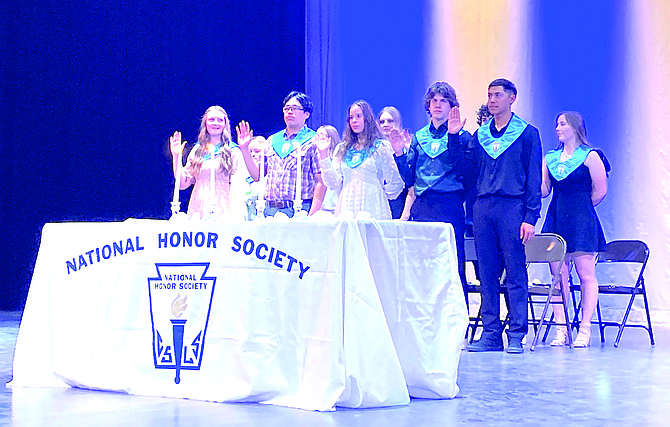 NHS inductees take the oath of membership on May 6.