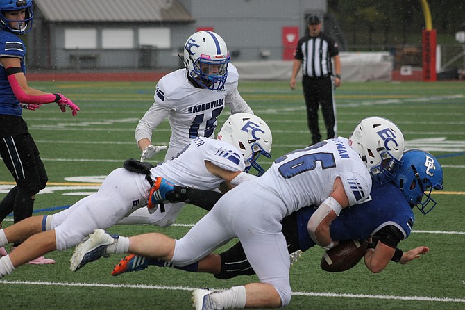 Eatonville's Dylan Norman tackles and forces a fumble against Bellevue Christian.