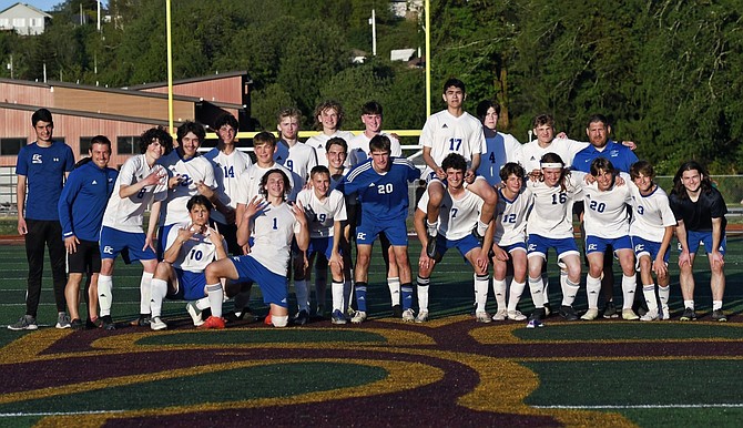 Eatonville High School's boy soccer team poses for a team photo after downing the Raymond-South Bend Ravens to stay alive in district play. Unfortunately, their season would come to an end following a defeat in their next match.