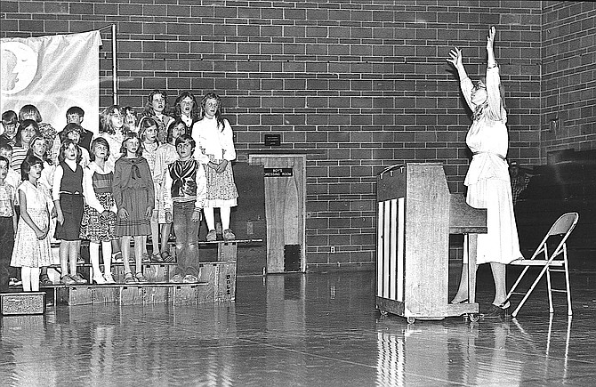 Jackie Maye conducts the Gardnerville Elementary School Choir on April 5, 1979. R-C File Photo