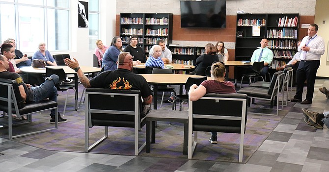 Carson City School Superintendent Andrew Feuling, far right, addresses Monday proposed changes to make Pioneer Academy an off-site, alternative campus of Carson High.