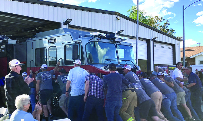 New Engine 2 is pushed into the station on May 10 at the Fallon/Churchill Volunteer Fire Department's street dance.