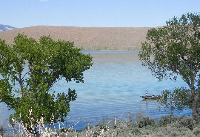 An angler on Topaz Lake on May 12. Conditions on the lake were breezy on Sunday with 20-30 mph wind gusts reported from weather stations on either end.