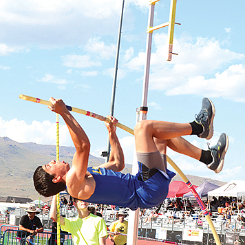 Lowry's Brent Kenison begins his attempt in the pole vault at the NIAA State Track and Field Championships in Carson City,