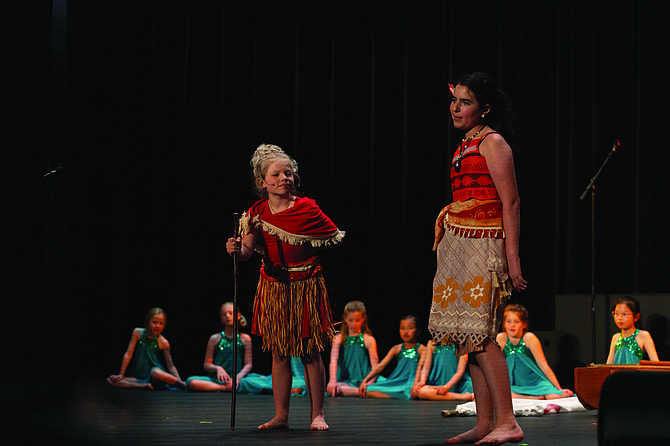 Vaeda Caruso, left, and Oriana Turow in Coe Elementary School’s Musical Theatre Club production of Moana at Ballard High School.