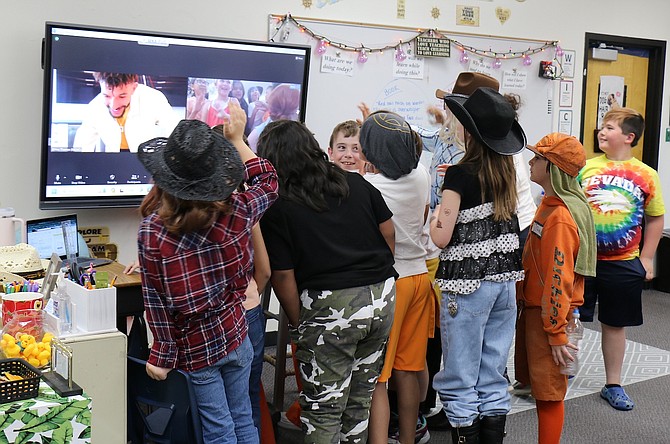 Students from Allie Davis’ fourth grade class at Bordewich Bray Elementary School on May 22, 2024 gathered in a virtual visit with actor Khleo Thomas to talk about his experiences filming the 2003 movie “Holes.” Students dressed up as their favorite characters and brought snacks to class.