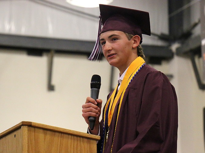 Sierra Lutheran High School co-valedictorian Joseph Seddon gives his commencement address Saturday during the school’s graduation ceremony.