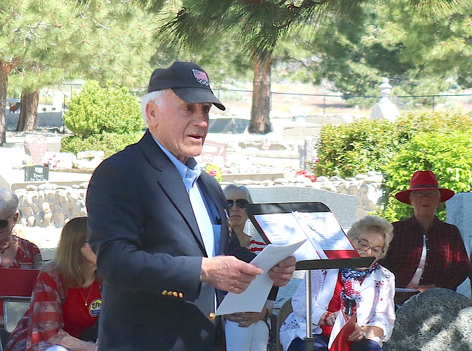 Former POW Larry Friese speaks at the Genoa Cemetery for an observance of Memorial Day.